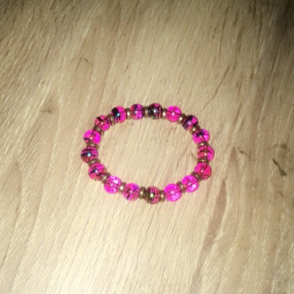 Pink and gold bracelet. - Picture 1 of 3